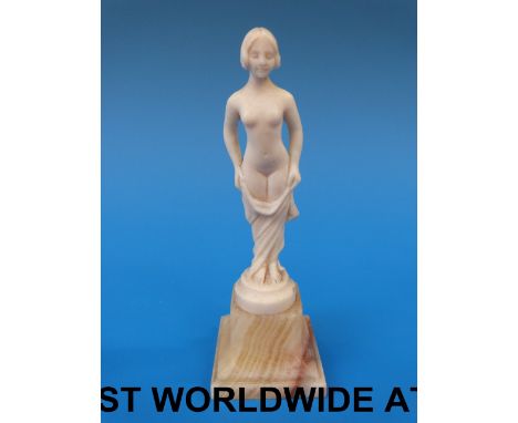 An European ivory figure of a female nude (signed)