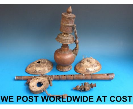 A Tibetan teapot with prayer scroll and various other Tibetan items