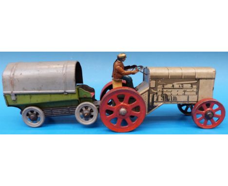 A German tin plate tractor and covered trailer 