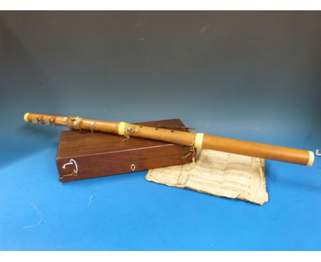 A 19thC fitted-cased boxwood and ivory flute by W. Milhouse, London, with receipt dated 1828 for £2 7s 6d