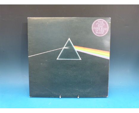 PINK FLOYD "Dark Side Of The Moon".  This is the very rare first pressing with SOLID BLUE TRIANGLE on the label and SHVL 804 