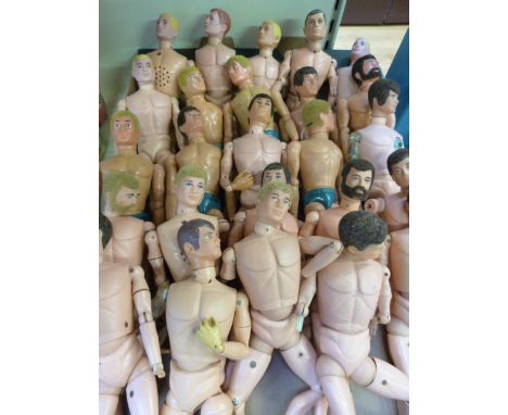Twenty-five Action Man figures, including two talking commandos