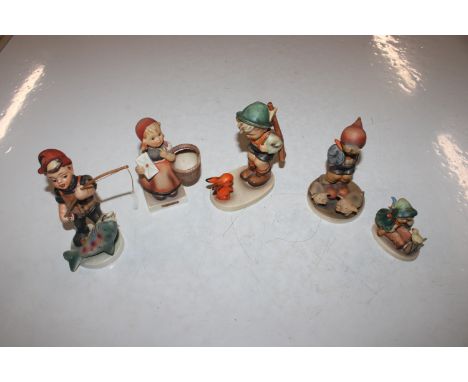 Four Goebel figures and one other 