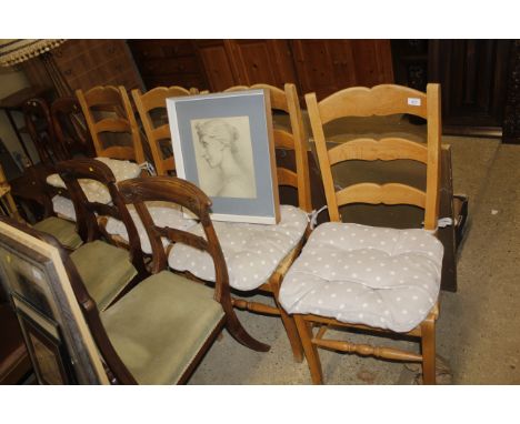 A set of four rush seated ladder back chairs 