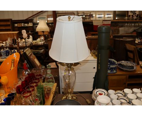 A brass and cut glass table lamp and shade 