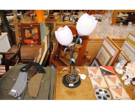 A metal and glass table lamp