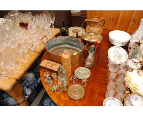 A twin handled copper planter; a copper and brass kettle; a harvest ware jug; a brass shoe ornament, ash tray etc.