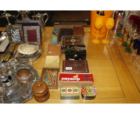 A collection of wooden trinket boxes, boxed dominoes, playing cards etc. 