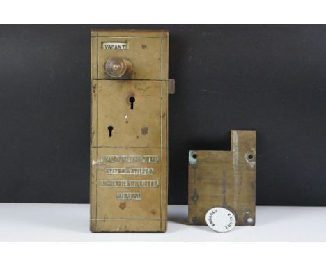 Early 20th Century Lockerbie and Wilkinson Brass coin operated toilet door lock with enamelled vacant / engaged panel and coi