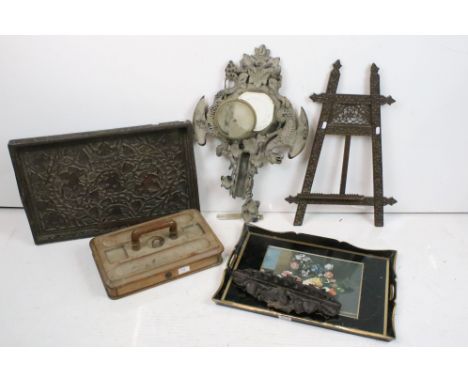 Black Forest style carved wooden twin-handled tray with grape vine decoration (61cm wide), together with a Black forest style