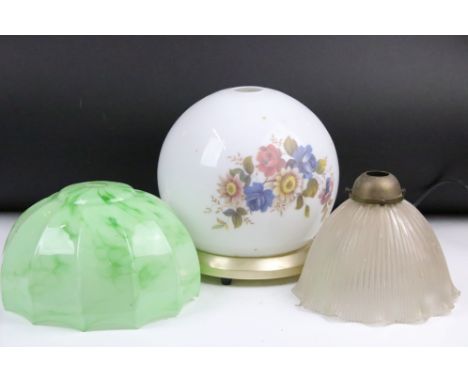 Three glass light shades to include an Art Deco green streaked example (approx 25cm wide), 19th century moulded glass shade a