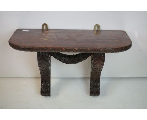 19th century Mahogany Bracket Shelf with foliate carving, 37cm wide x 32cm high 