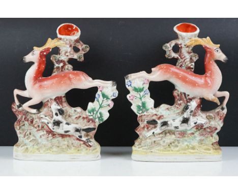 Pair of 19th Century Victorian flat back vases featuring leaping deer and hunting hounds. Measures 31cm tall. 