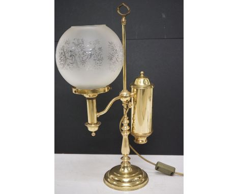 Brass table lamp, the globular shade of etched design, 57.5cm high 