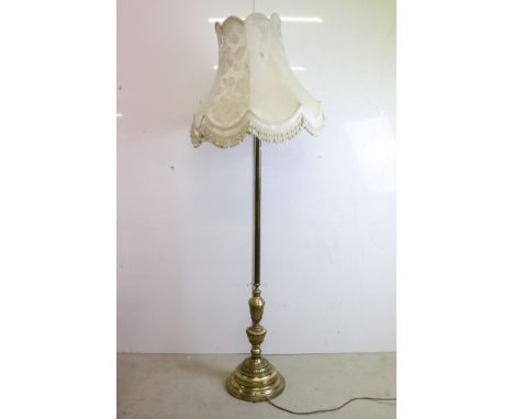 Brass Standard Lamp raised on a stepped circular base, with shade, total height 188cm 