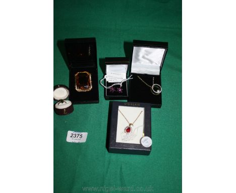 A pretty gold coloured unusual two circle and pearl Necklace, D'orlan gold coloured Necklace with pendant, red and white ston