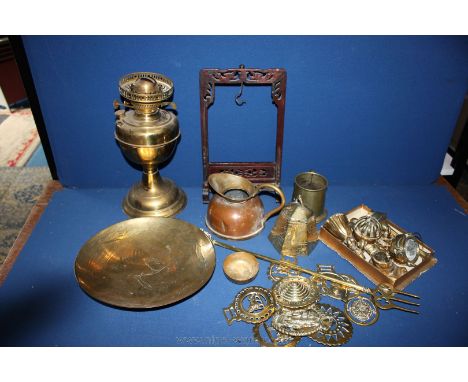 A large box of Brass including warming pan, toasting fork, collection of novelty table bells, horse brasses, Chinese bell, et