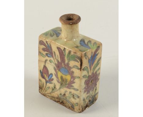 A Persian pottery flask, 18th/19th century, the rectangular body decorated with a fish to one side amongst foliage, height 16