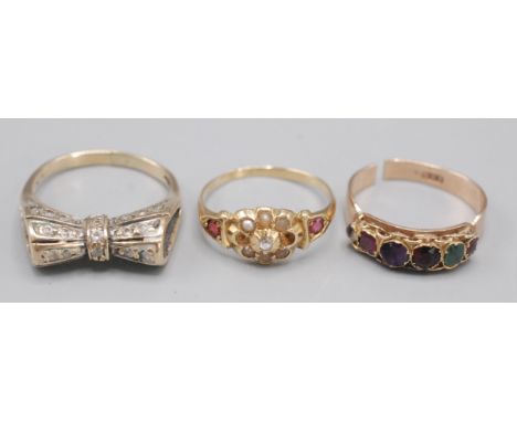 A 9ct gold 'regard' ring, together with two other rings.