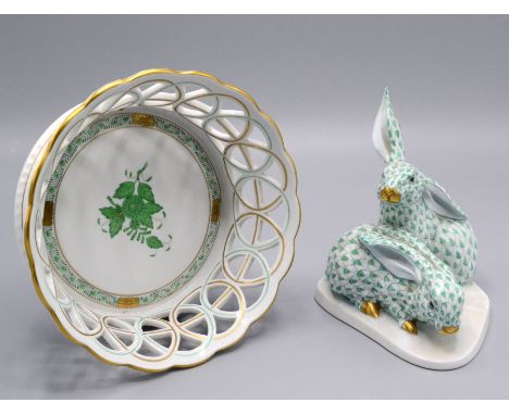 A Herend Hungary porcelain group of rabbits, height 14.5cm, width 12.5cm and a Herend porcelain basket, diameter 18.5cm.