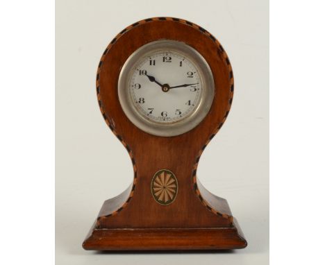 An inlaid mahogany mantle clock, early 20th century, the front with patera inlaid cartouche, height 15.5cm, width 11cm. 
