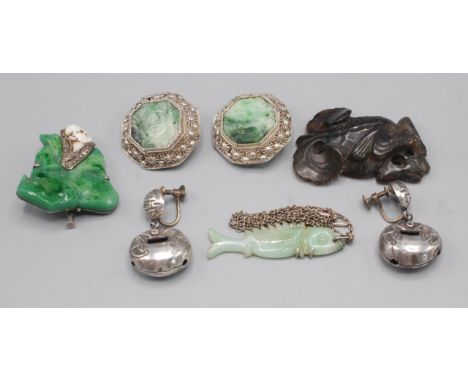 A pair of Chinese silver mounted jade clip on earrings 1950's Romanian marks together with a jade fish pendant and a jade mou