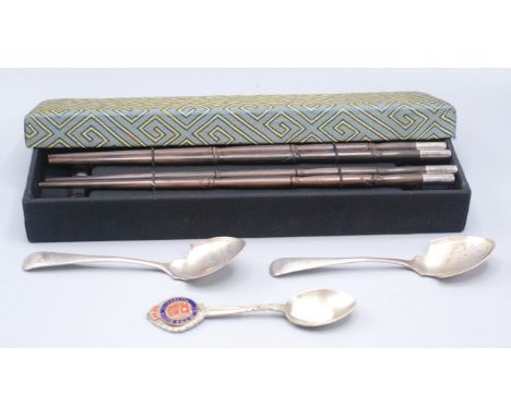 Two pairs of modern oriental silver mounted hardwood chopsticks and rests, together with a pair of silver conserve spoons and