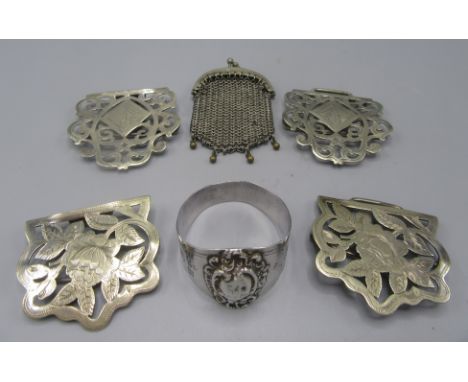 A late Victorian silver napkin ring, two EPNS buckles etc.