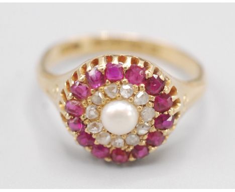 A mid Victorian 18ct gold ring by F & P, target set with a central pearl within bands of diamonds and rubies, hallmarked Birm