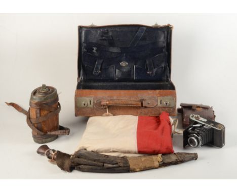 A kukri with wooden handle and sheath, length 49cm, a wooden water flask, a Voigtlander Prontor II leather cased camera, a St