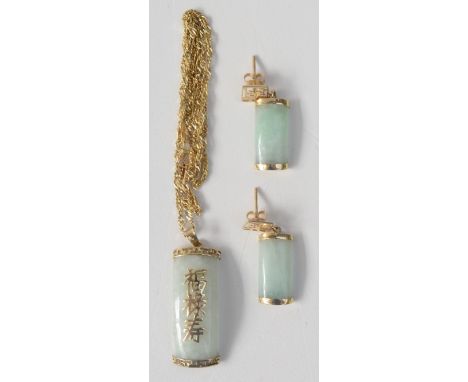 A Chinese 9ct gold mounted jade pendant on gold chain and a pair of matching earrings. 