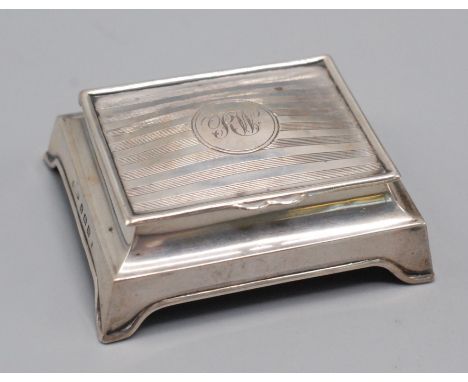 An engine turned silver two compartment table top stamp box with sprung lid, Birmingham 1911. 