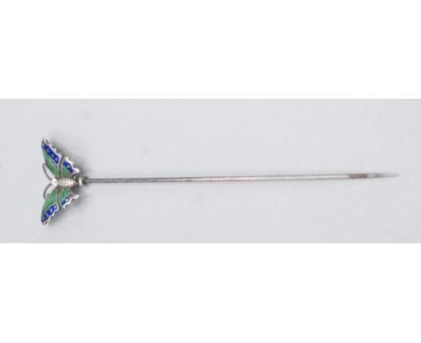 A Charles Horner hallmarked silver and enamelled hat pin with hinged butterfly finial, length 11.6cm.