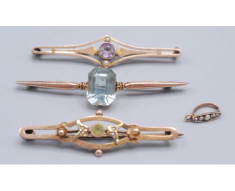 A 15ct gold bar brooch, two other gold bar brooches and a gold pearl set suspension loop.