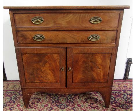 A George III mahogany commode, the rectangular top above two cockbeaded drawers and two cupboard doors on bracket feet, heigh