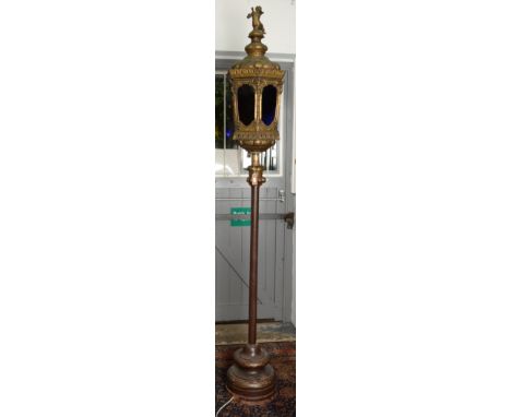 An impressive Venetian lantern in 18th century style with cherub finial, the six glass panels separated by cherubs beneath an
