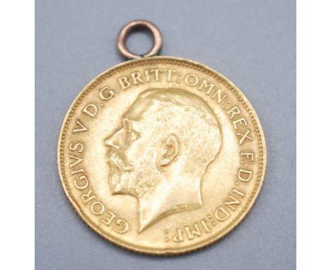 A George V half sovereign, 1912, mounted with a ring.