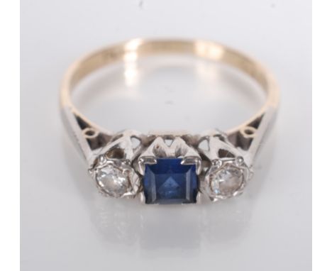 A sapphire and diamond 18ct gold ring.   Condition report:  Wear to shank.Hall marked but worn can just read 18.