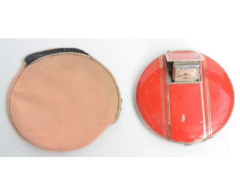 An Art Deco red enamel and chromium plated combination compact timepiece. 