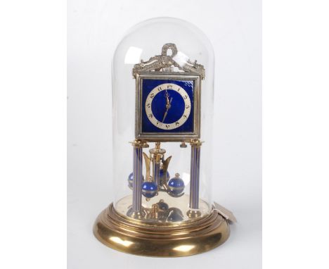 A Jahresuhren-fabrik torsion clock, with blue guilloche enamel dial and pendulum, complete with glass dome, height 30cm. 