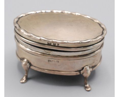 A silver ring box. 