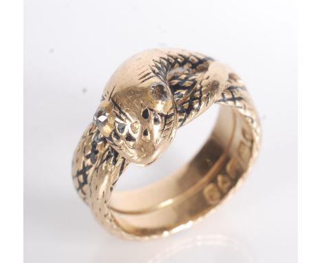 A rare George IV snake ring in 18ct gold, the serpent's skin enamelled black, its eyes set with diamonds, hallmarked London 1