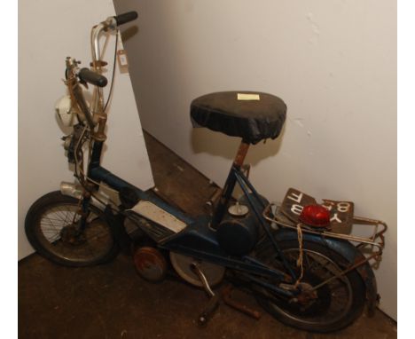 A Raleigh Wisp moped with 49cc engine circa 1967 registration YNB854F, sold with original cancelled logbook and vehicle regis