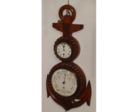 A late 19th/early 20th century clock barometer, the oak case in the form of an anchor, dial inscribed 'A Casartelli Optician,