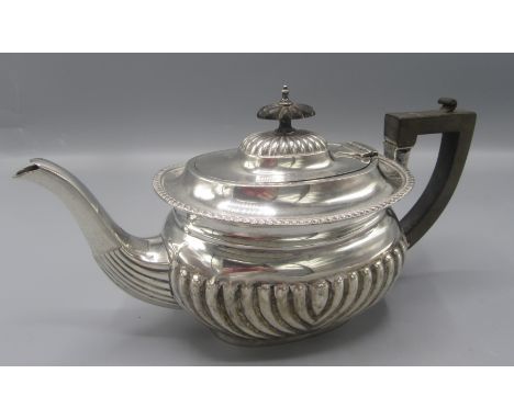 A bachelor's half fluted oval section Edwardian teapot, 10.1oz.