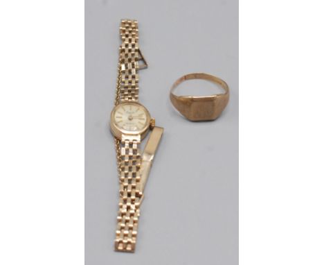 A 9ct. gold signet ring and a ladies gold cased Everite wristwatch with 9ct. gold bracelet.   Condition report:  Ring 4.25gWa