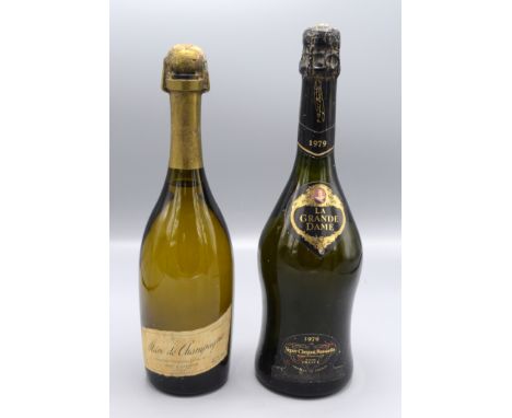 A bottle of Veuve Clicquot Ponsardin, La Grande Dame Champagne 1979, height 32.5cm and a bottle of Marc de Champagne, Moet & 