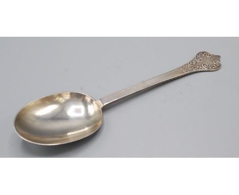 A Britannia standard spoon in 17th century style with lace back bowl, 2.2oz.
