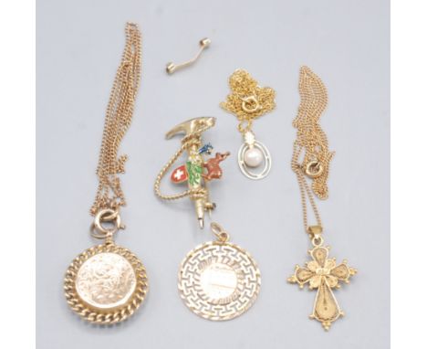An 18ct gold filigree cross, a Greek 14ct gold pendant, a gold compass fob, a gold pearl pendant and a gilt souvenir brooch.