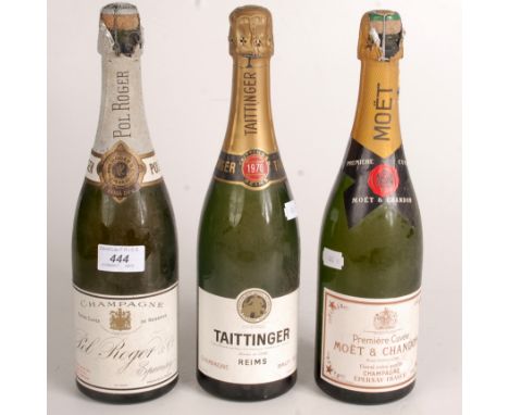 A bottle of Taittinger 1970 vintage champagne and two bottles of non vintage champagne.